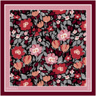 Fearlessly Floral silk scarf: red, rose and blush flowers with grey leaves packed onto a black ground, framed in pink and burgundy